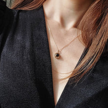 Load image into Gallery viewer, Onyx and Rose Gold Pendant
