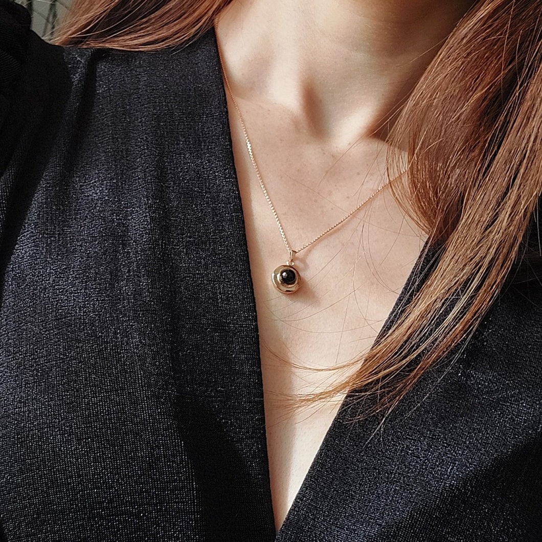 Onyx and Rose Gold Pendant